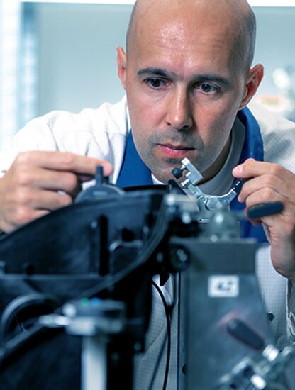 Scientific employee in a national metrology institute during a measurement process